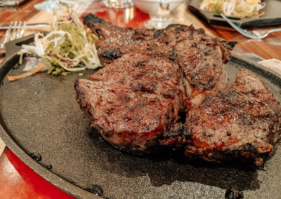 An Steak from the butchers cut with some salad on the side