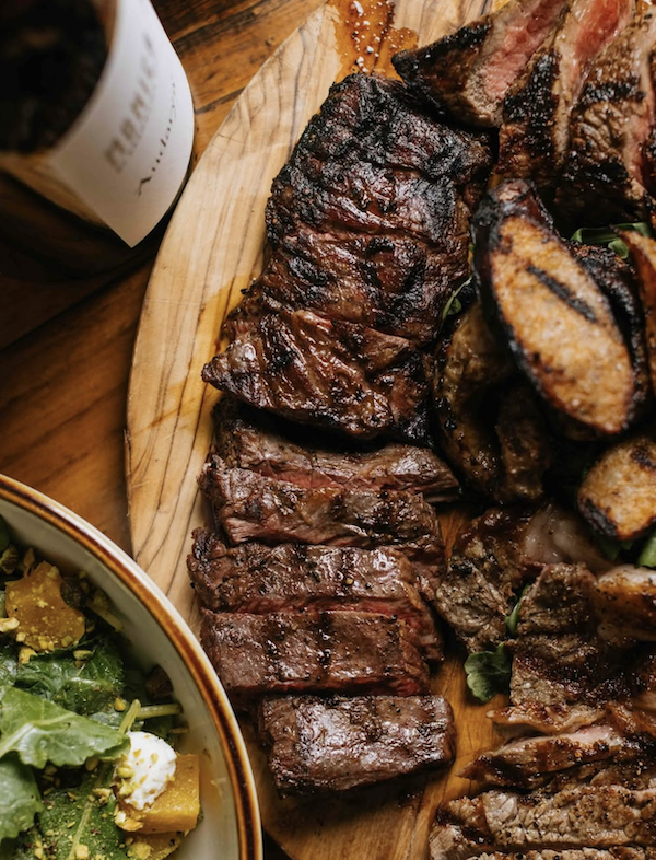 Wood-fired ribeye steak at Carbon Angela’s in San Diego